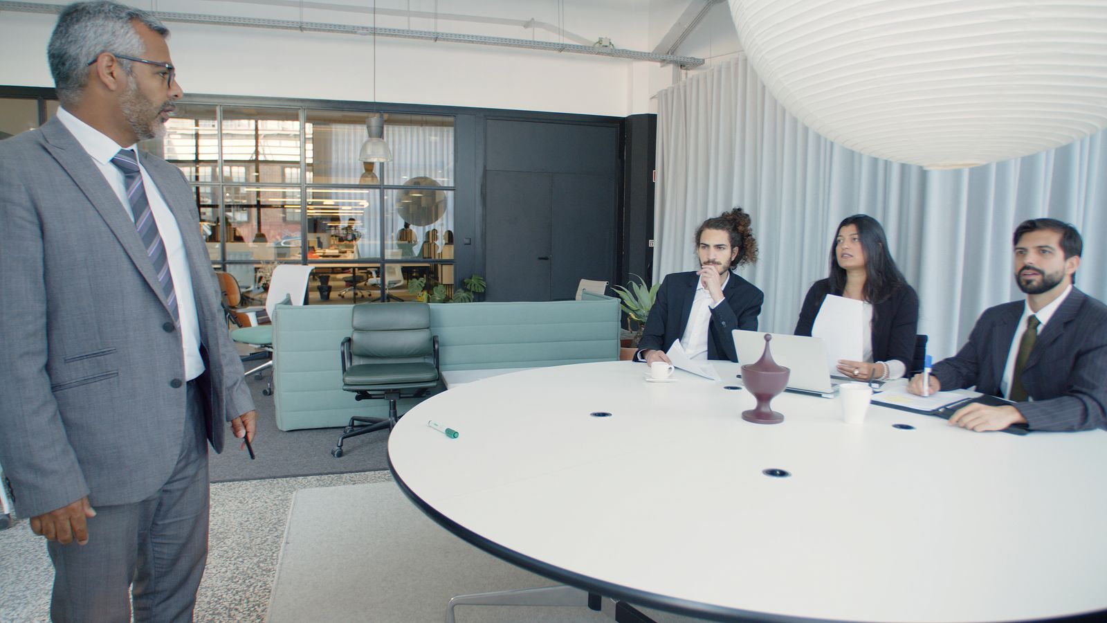 Team reviewing Odoo ERP implementation at a client site